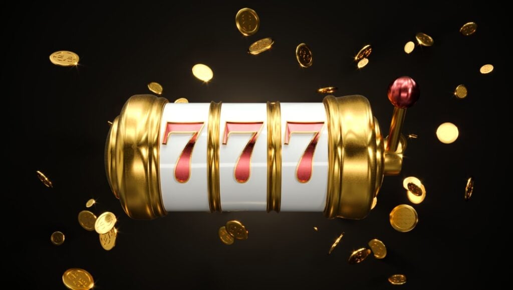 A golden slot machine reel displaying triple red sevens is surrounded by flying gold coins against a black background.