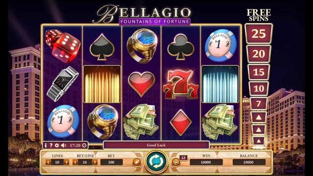 A screenshot of the slot reels in Bellagio Fountains of Fortune. The background is the Bellagio resort, hotel, and casino at night. In the foreground are the game’s slot reels and interface, which are rendered in luxurious gold and purple colours. The reels contain a variety of rich symbols, including a pair of red dice, a watch, a casino chip, a ring with a blue gem, stacks of cash, three red 7s, a heart card suit, a diamond card suit, a club card suit, a spade card suit, gold Bellagio fountains, and blue Bellagio fountains.