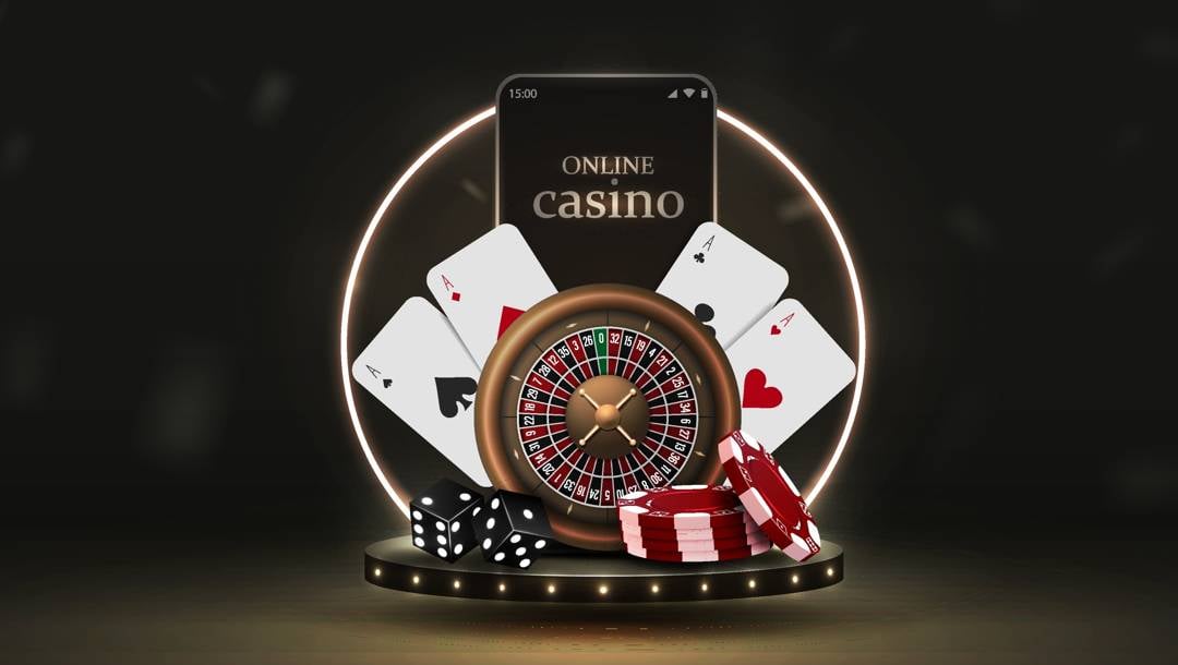 A dark, spotlight-style background frames a glowing circular neon ring. In the ring an upright smartphone displays the words “ONLINE casino”. In the foreground, a fan of four aces (spades, diamonds, clubs, hearts) arcs behind a bronze-rimmed roulette wheel placed center-stage on a low, lit podium. It’s flanked by a pair of black dice on the left and neatly stacked red-and-white poker chips on the right.