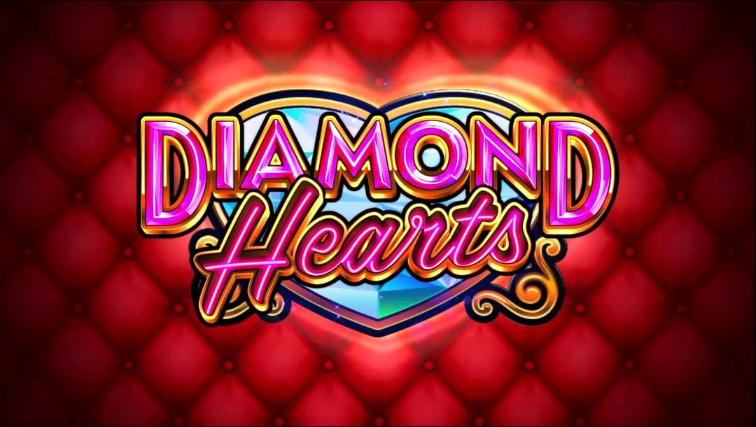 The Diamond Hearts slot logo, featuring bold neon-pink letters outlined in gold and layered over a large, sparkling diamond-shaped heart with cyan and blue tones. The background is a deep red quilted pattern with a buttoned upholstery texture.
