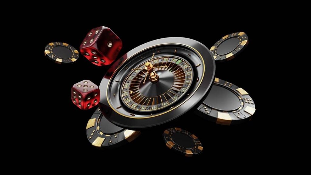 A sleek black and gold roulette wheel floating against a plain black background alongside red dice and black casino chips.
