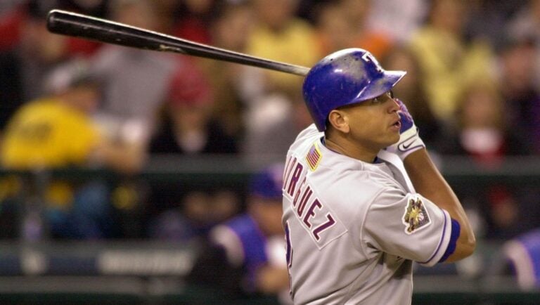 Texas Rangers' Alex Rodriguez watches the flight of his third-inning home run against the Seattle Mariners Thursday, Oct. 4, 2001, in Seattle.