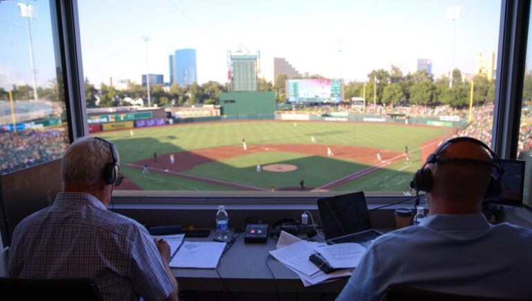 Athletics' broadcaster Ken Korach, left, calls a baseball game between the Athletics and the Atlanta Braves, Thursday, July 10, 2025, in West Sacramento, Calif.