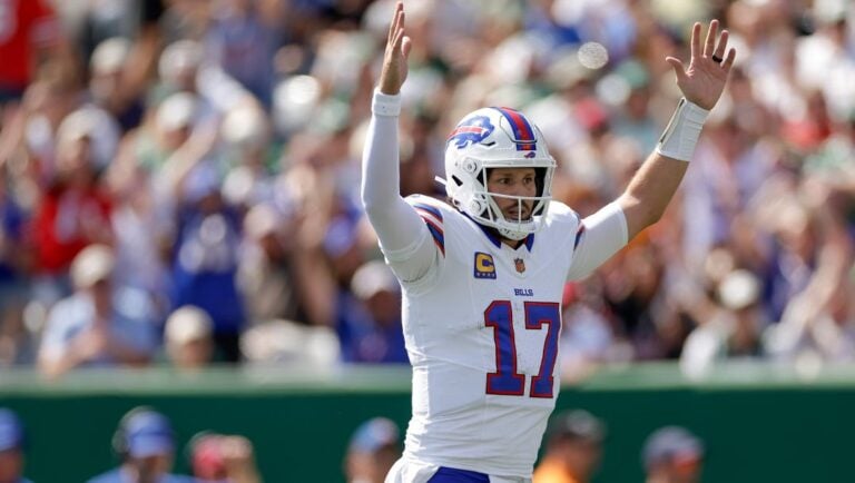 Buffalo Bills quarterback Josh Allen (17) reacts after a touchdown against the New York Jets during the first quarter of an NFL football game, Sunday, Sept. 14, 2025, in East Rutherford, N.J.