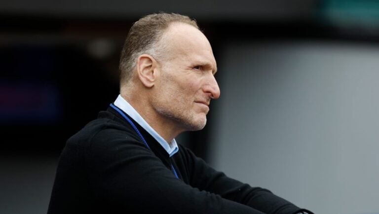 Toronto Blue Jays President and CEO Mark Shapiro stands in the dugout before a baseball game against the Cleveland Guardians, Thursday, May 5, 2022, in Cleveland.