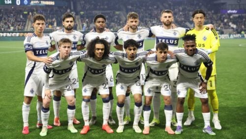 The Vancouver Whitecaps starting xi stand for a photo before an MLS soccer match against the Portland Timbers, Saturday, March 7, 2026, in Portland, Ore.