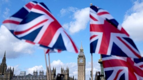 Union Jack flags are seen surrounding the Elizabeth Tower, known as Big Ben, beside the Houses of Parliament in London, Friday, June 24, 2022.