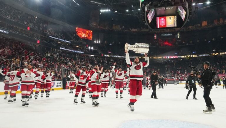 Carolina Hurricanes center Jordan Staal (11) lifts the Stanley Cup after a win over the Vegas Golden Knights in Game 6 of the NHL hockey Stanley Cup Final series, Sunday, June 14, 2026, in Las Vegas.