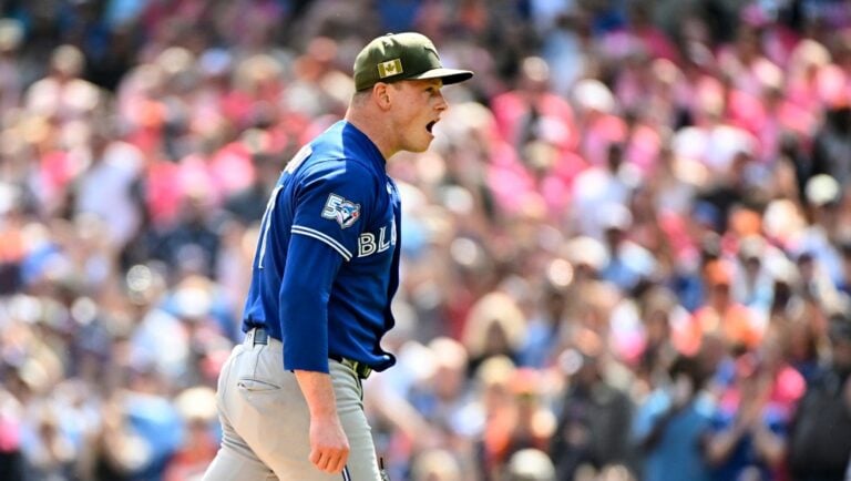 Toronto Blue Jays relief pitcher Louis Varland reacts after the final out of the 10th inning during a baseball game against the Detroit Tigers, Saturday, May 16, 2026, in Detroit.