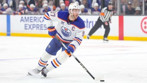 Edmonton Oilers center Connor McDavid moves the puck during the first period of an NHL hockey game against the Los Angeles Kings April 11, 2026 in Los Angeles.