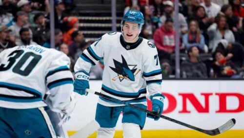 San Jose Sharks center Macklin Celebrini, right, talks with goaltender Yaroslav Askarov during the third period of an NHL hockey game against the Anaheim Ducks, April 9, 2026, in Anaheim, Calif.