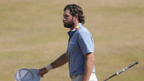 Cameron Young of the United States acknowledges the crowd as he walks off the 18th green after completing his final round during the final day of the British Open Golf championships at Royal Birkdale golf club, in Southport, England, Sunday, July 19, 2026.