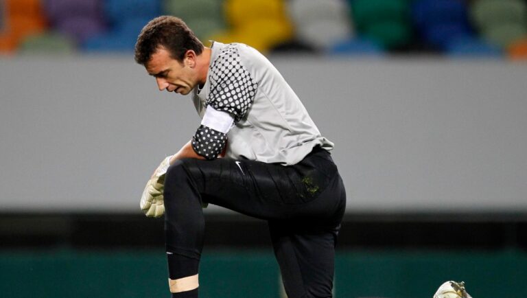 Levski's goalkeeper Georgi Petkov reacts after Sporting scored their 5th goal during their Europa League group C soccer match Thursday, Sept. 30 2010, at Sporting's Alvalade stadium.