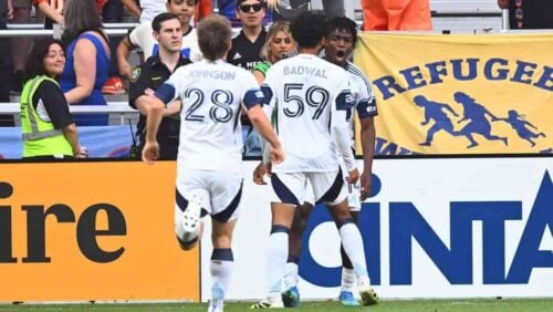 Vancouver Whitecaps FC Jeevan Badwal, center, celebrates his first half goal with Bruno Caicedo, right, during the first half of an MLS soccer match against FC Cincinnati in Cincinnati, Wednesday, July 22, 2026.